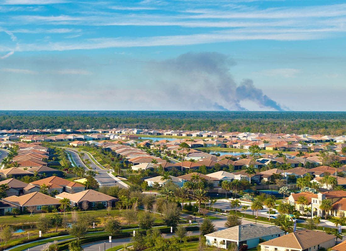Seffner, FL - Suburban Neighborhood in Florida Suffering From Bad Air Quality Polluted With Prescribed Forest Fire Smoke